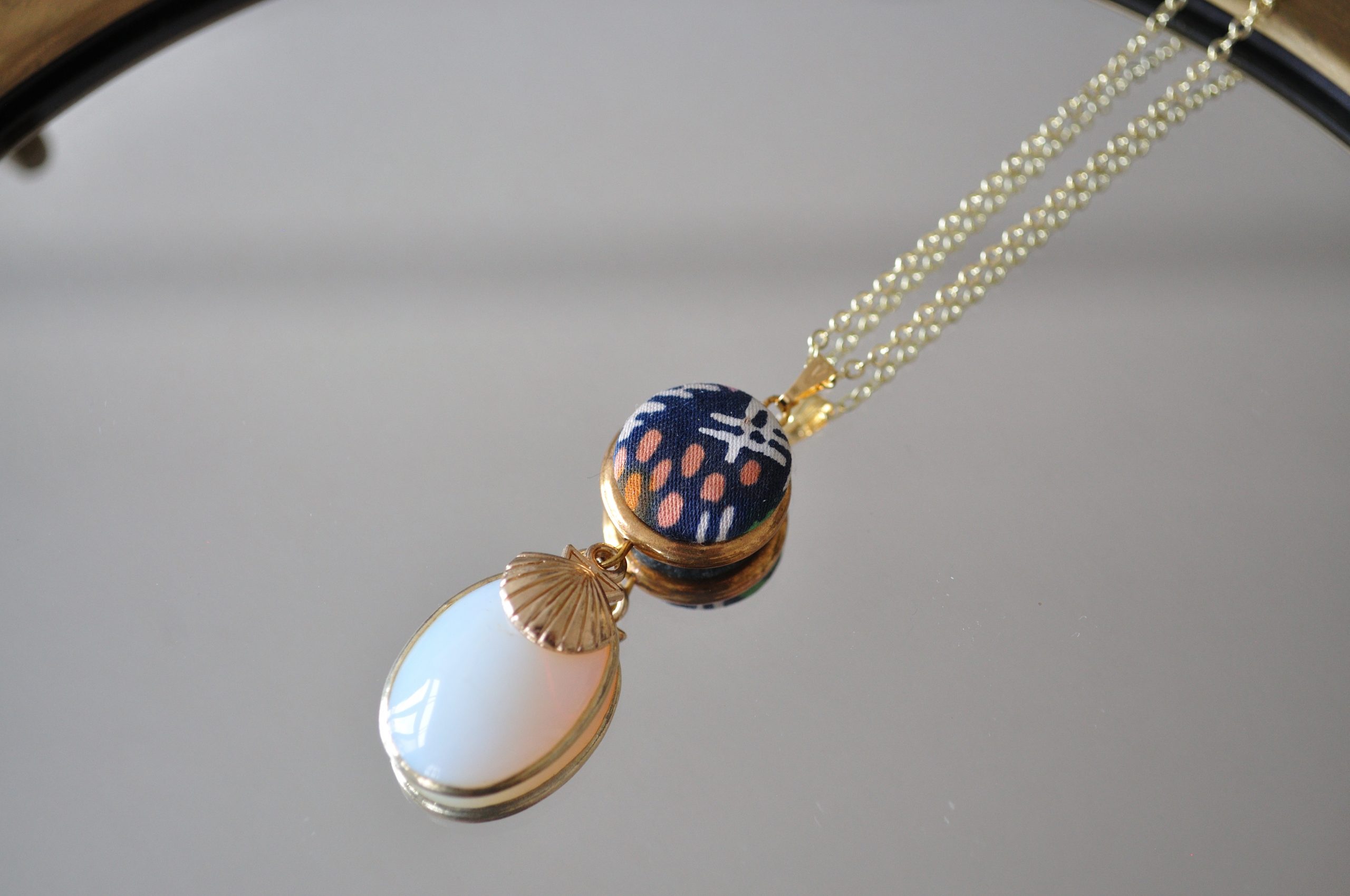 Asian-inspired, find gold-plated necklace art deco style with Opalite cabochon pendant and stylised shell pendant
